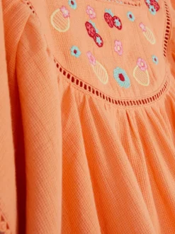 Haftowana sukienka plażowa typu kaftan