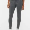 Jeansy ze średnim stanem o kroju skinny | standard