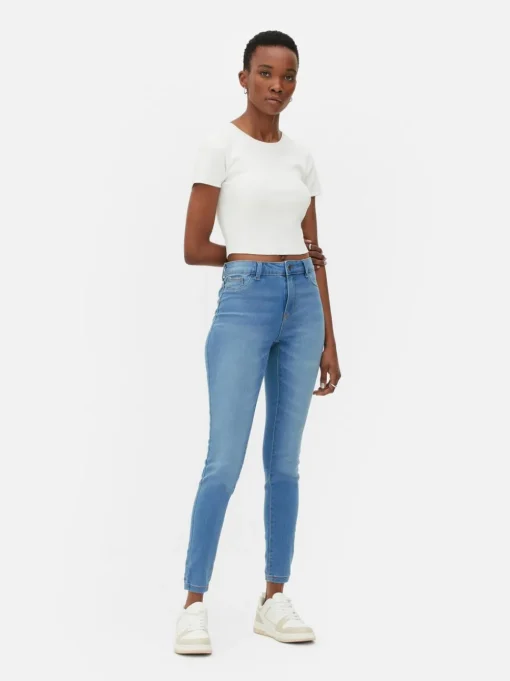 Jeansy ze średnim stanem o kroju skinny | standard