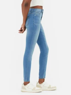 Jeansy ze średnim stanem o kroju skinny | standard