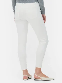 Jeansy ze średnim stanem o kroju skinny | standard