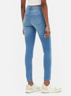 Jeansy ze średnim stanem o kroju skinny | standard