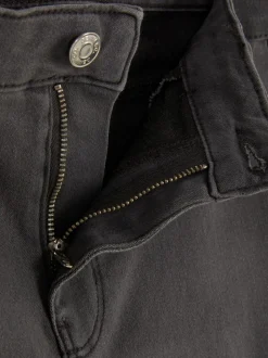 Jeansy ze średnim stanem o kroju skinny | standard