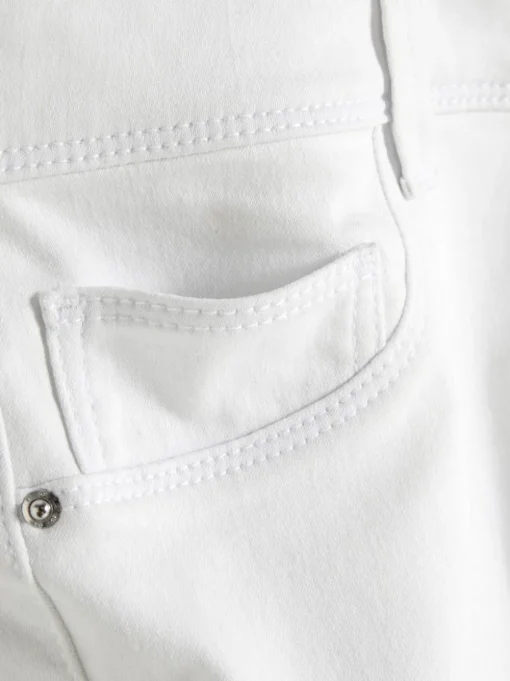 Jeansy ze średnim stanem o kroju skinny | standard