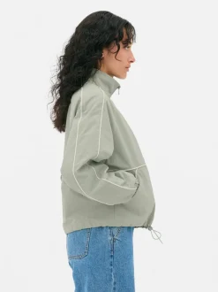 Kurtka przeciwdeszczowa z ozdobną lamówką