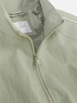 Kurtka przeciwdeszczowa z ozdobną lamówką