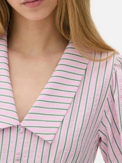 Minisukienka popołudniowa w paski z guzikami