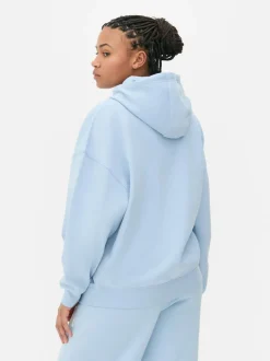 Oversize'owa bluza z kapturem i nadrukiem