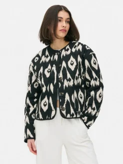 Pikowana kurtka z zapięciem na guziki