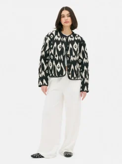 Pikowana kurtka z zapięciem na guziki