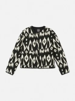 Pikowana kurtka z zapięciem na guziki