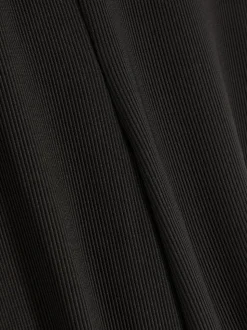 Prążkowane spodnie z rozszerzaną nogawką