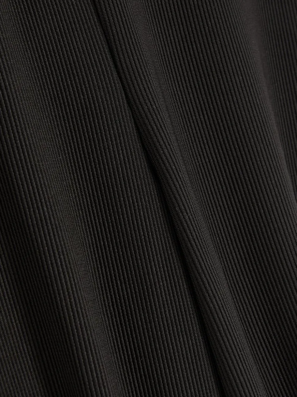 Prążkowane spodnie z rozszerzaną nogawką