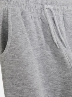 Spodnie dresowe ze sznurkiem w pasie i ściąganymi nogawkami