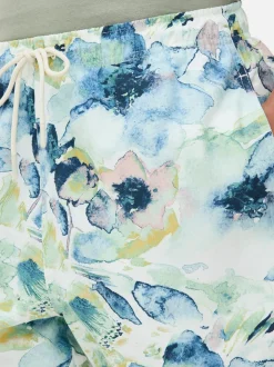 Szorty kąpielowe ze sznurkiem w akwarelowe kwiaty