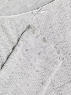 Ażurowa góra od piżamy z muszelkowym wykończeniem