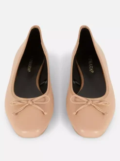 Baleriny na płaskiej podeszwie z kokardką