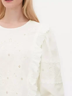 Bluzka z falbanką i bufiastymi rękawami