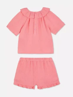 Bluzka z kołnierzykiem i szorty z falbankami