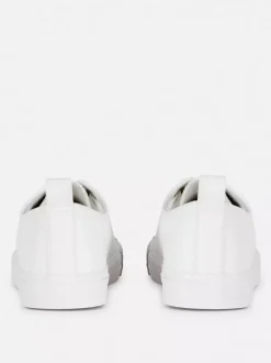 Buty sportowe ze sztucznej skóry z niską cholewką