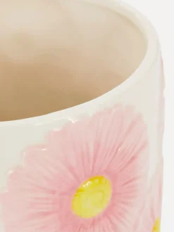 Ceramiczna doniczka z motywem kwiatowym