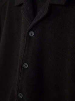 Dżersejowa koszula z zapięciem na guziki