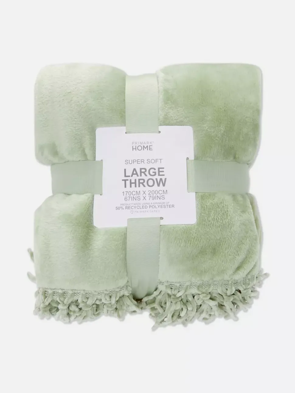 Duża miękka narzuta z frędzlami przy obszyciu