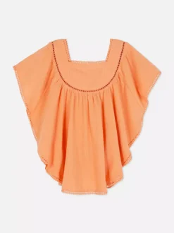 Haftowana sukienka plażowa typu kaftan