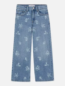 Jeansy z szeroką nogawką w kwiaty
