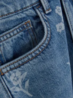 Jeansy z szeroką nogawką w kwiaty