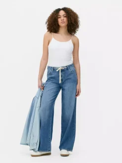 Jeansy z szerokimi nogawkami i wiązaniem w talii