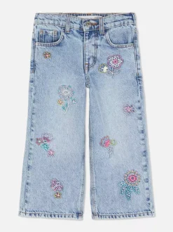 Jeansy z szerokimi nogawkami i haftem