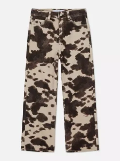 Jeansy z szerokimi nogawkami w krowie łaty