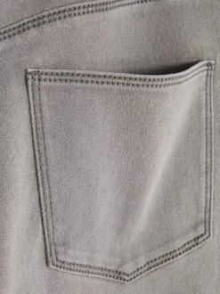 Jeansy ze średnim stanem o kroju skinny | standard