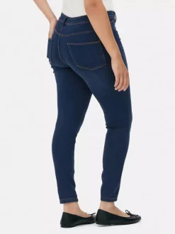 Jeansy ze średnim stanem o kroju skinny | standard