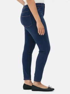 Jeansy ze średnim stanem o kroju skinny | standard