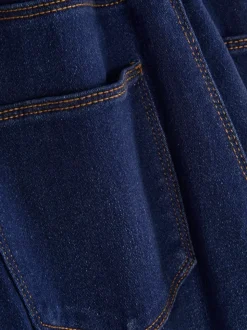 Jeansy ze średnim stanem o kroju skinny | standard