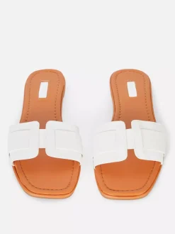 Klapki typu mule z plecionymi paskami