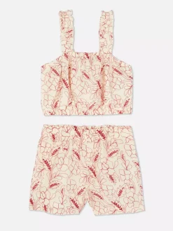 Komplet z topem i szortami z kwiatowym haftem