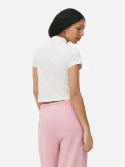 Koszulka polo z krótkim rękawem i haftowanym misiem