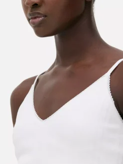 Krótka ażurowa koszulka na ramiączkach do spania