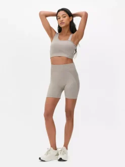 Krótki asymetryczny top Kappa x Primark