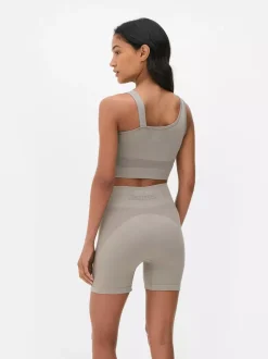 Krótki asymetryczny top Kappa x Primark