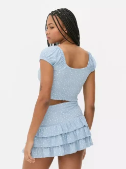 Krótki top z nadrukiem i marszczeniami od zestawu