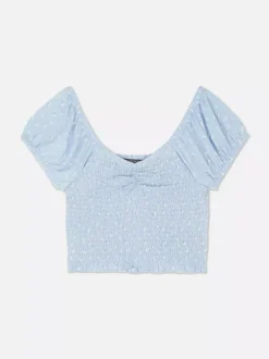 Krótki top z nadrukiem i marszczeniami od zestawu