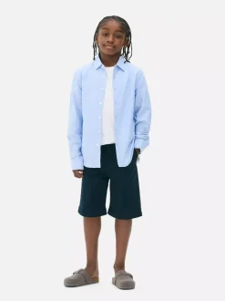 Krótkie chinosy z wywiniętą nogawką