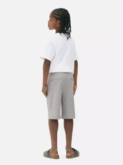 Krótkie chinosy z wywiniętą nogawką