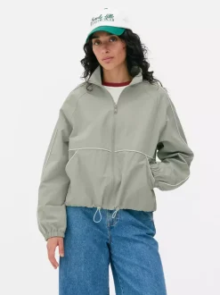 Kurtka przeciwdeszczowa z ozdobną lamówką