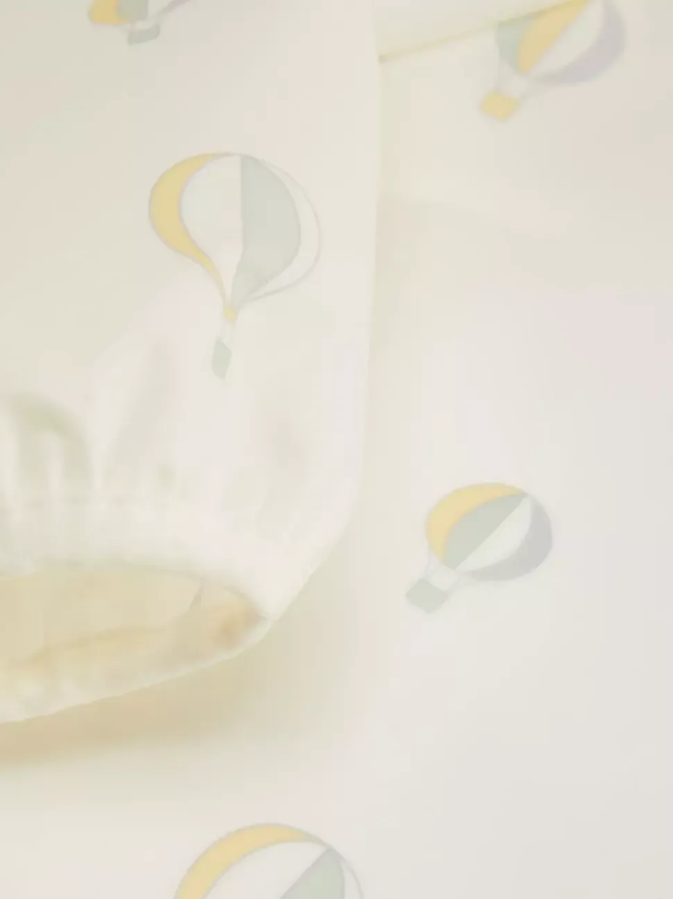 Śliniak z motywem balonów