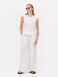 Lniana bluzka bez rękawów The Edit